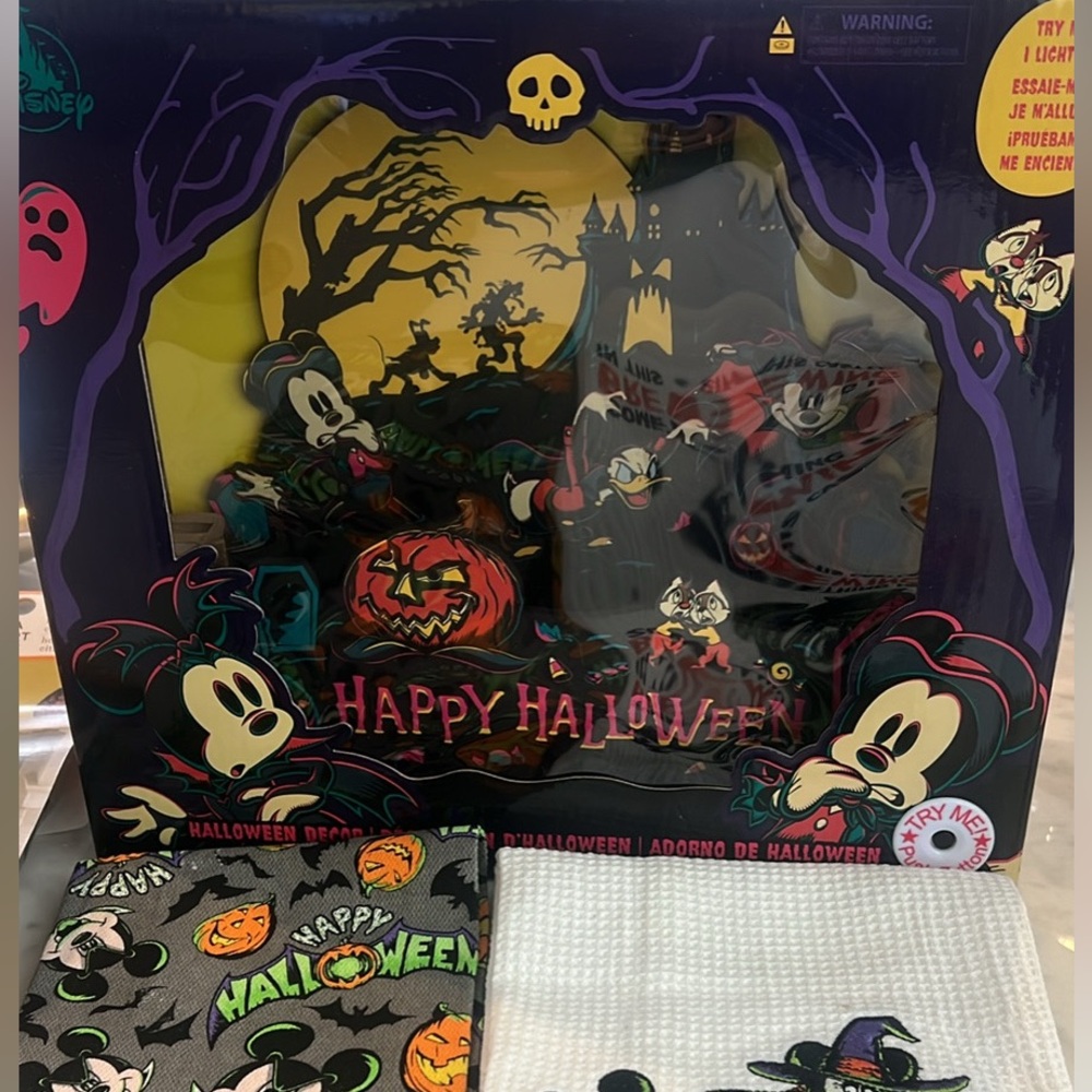 Disney happy Halloween light up sign with kitchen towels